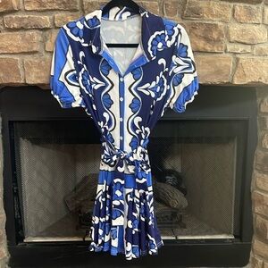 NWOT Blue, white and black floral button down dress with pleated bottom. Medium